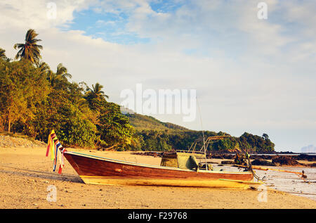 boats on coast at low tide, Koh Libong, Thailand Stock Photo