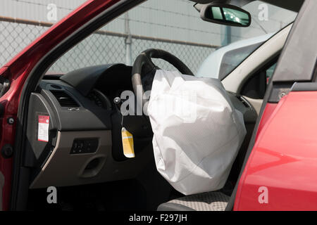 wrecked car with airbag has been triggered Stock Photo