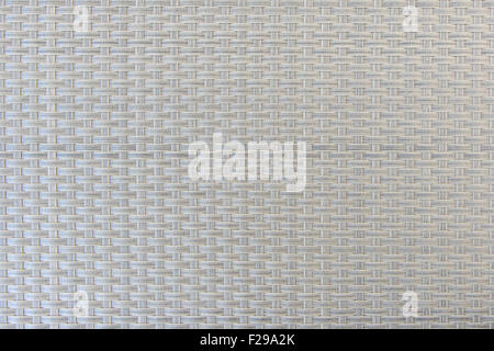Close-up of gray plastic weave as woven background texture or pattern. Stock Photo