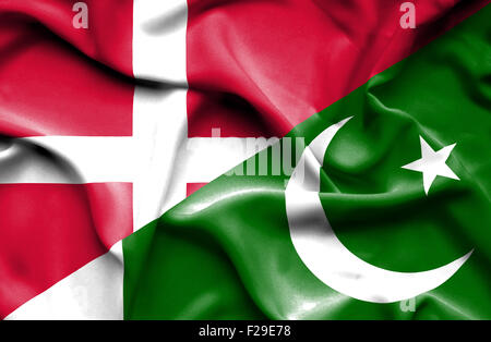 Waving flag of Pakistan and Denmark Stock Photo