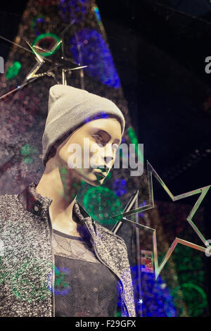 Mannequin at Christmastime in a shop window. Madrid Stock Photo