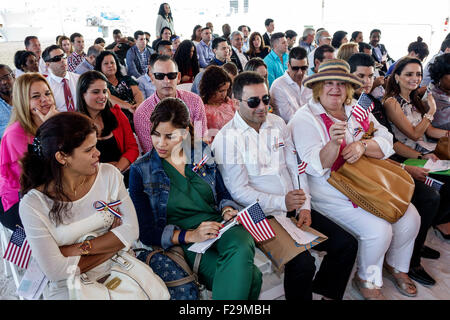 Miami Beach Florida,Oath of Citizenship Ceremony,immigrants,naturalization,citizen,swearing in,new citizens,allegiance,Hispanic man men male,woman fem Stock Photo