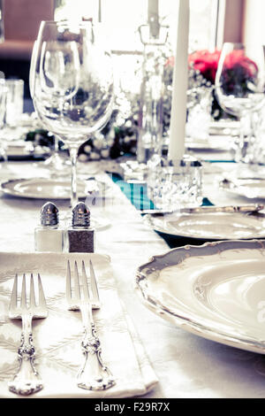 Dining table is set for a holiday dinner Stock Photo