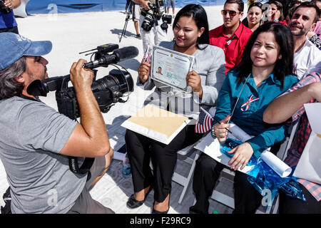 Miami Beach Florida,Oath of Citizenship Ceremony,immigrants,naturalization,citizen,swearing in,new citizens,allegiance,Hispanic man men male,woman fem Stock Photo