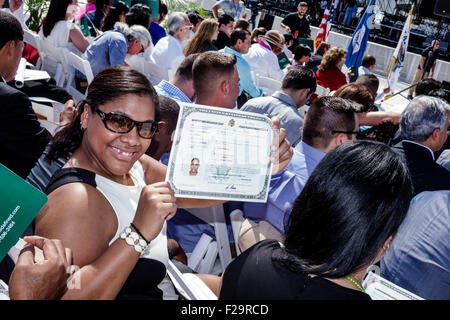 Miami Beach Florida,Oath of Citizenship Ceremony,immigrants,naturalization,citizen,swearing in,new citizens,allegiance,Certificate of Naturalization,s Stock Photo