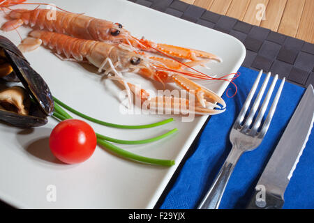 Scampi and shrimp on dish Stock Photo