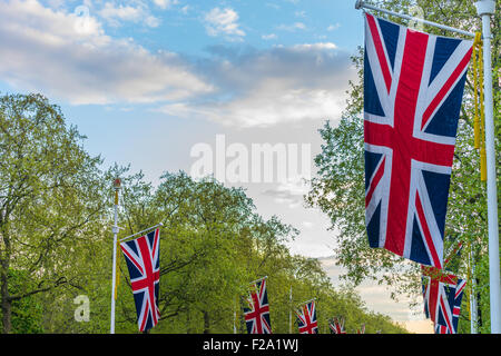 Lines of union jack flags hanging along the Mall, London Stock Photo