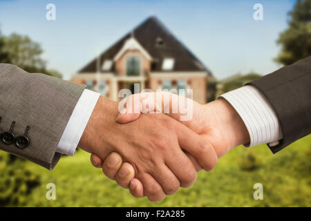 Handshaking for House Stock Photo