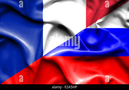 Waving flag of Russia and France Stock Photo