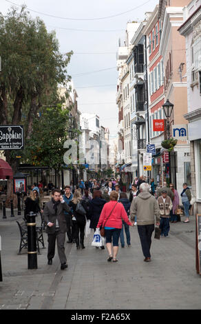 Shoppers in Main Street, Gibraltar, British territory in southern Europe Stock Photo