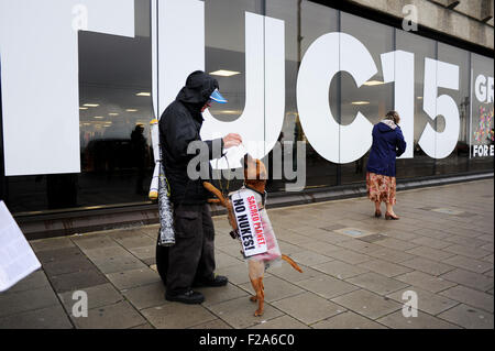 Brighton, UK. 15th September, 2015. An anti nuclear weapon protester with his dog wearing a protest message outside the TUC Conference being held in the Brighton Centre this week  Credit:  Simon Dack/Alamy Live News Stock Photo