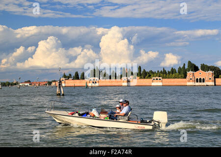 Venetians by boat, Laguna Veneta, Venice Stock Photo