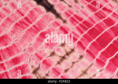 Abstract Background of  Red, White,and Pink Tie and Dye Cloth Stock Photo