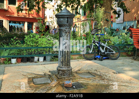 Water fountain, Campo San Giacomo, Venice Stock Photo