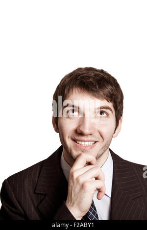 Think concept - pensive young businessman isolated on white Stock Photo