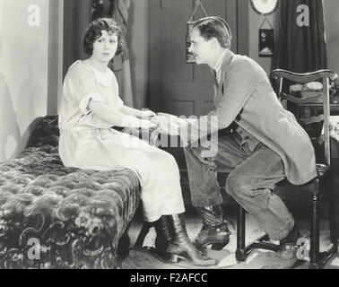 Convincing her to stay (OLVI008 OU482 F) Stock Photo