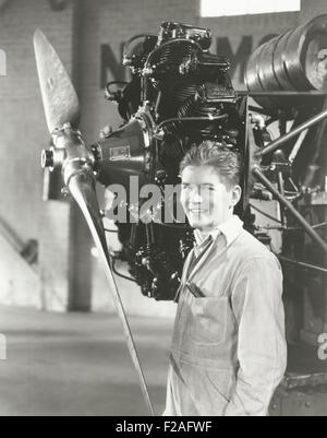 Mechanic standing next to propeller (OLVI008 OU297 F) Stock Photo