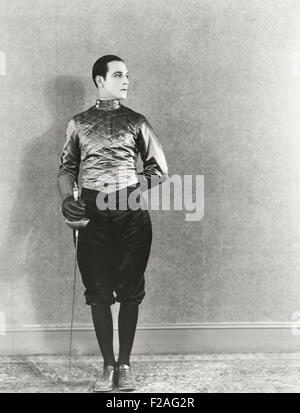 Swordsman posing with fencing foil (OLVI008 OU270 F) Stock Photo