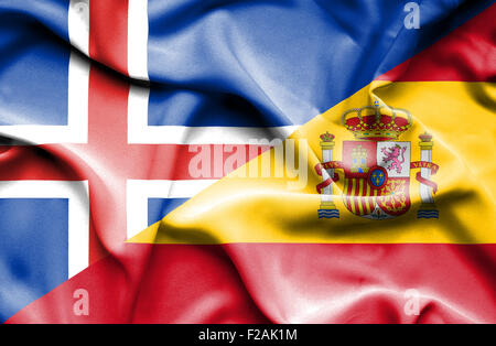 Waving flag of Spain and Iceland Stock Photo
