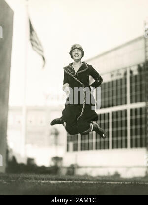 Jumping for joy (OLVI007 OU622 F) Stock Photo