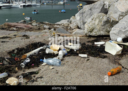 Trash in the ocean washed up on the beach Stock Photo - Alamy
