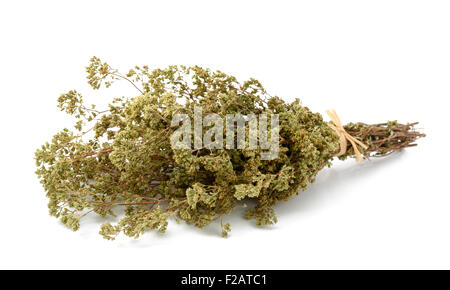 Dried oregano bouquet isolated on white Stock Photo