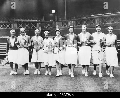 Wightman Cup teams at Wimbledon during a practice session on June 17, 1932. L-R: Helen Jacobs; Betty Nuthall; Anna McCune Harper; Phyllis Mudford King; Sarah Palfrey; Eileen Bennett Whittingstall; Peggy Saunders Mitchell; Helen Wills Moody; Dorothy Round. The Wightman Cup was an annual team tennis competition for women from the United States and Great Britain, 1923-1989. (CSU 2015 11 1579) Stock Photo