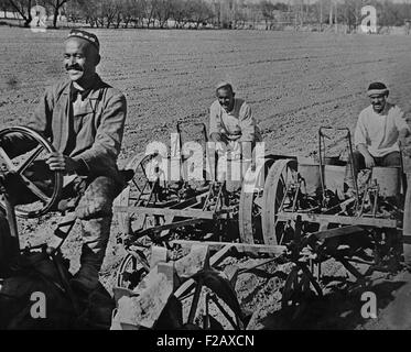 Planting cotton on the Navai collective farm, near Tashkent, Uzbekistan, USSR. Ca. 1935-40. (BSLOC 2015 2 257) Stock Photo