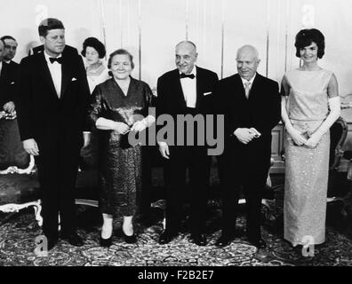 Reception at Schoenbrunn Palace during the June 1961 Vienna Summit between U.S. and Soviet Union. L-R: President John Kennedy, Nina Khrushchev, Austrian President Adolph Schaerf, Soviet Premier Nikita Khrushchev, and Jacqueline Kennedy. June 3, 1961. (CSU 2015 8 553) Stock Photo