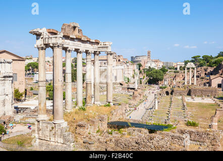 The columns are the ruins of The Temple of Saturn, a temple to the god Saturn in the Roman Forum  Rome Lazio  Italy EU Europe Stock Photo