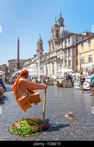 A Levitating man street artist street performer in the Piazza Navona Rome Italy Roma Lazio Italy EU Europe Stock Photo