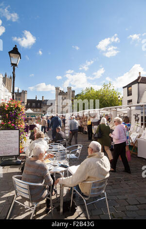 Wells Somerset city centre on a sunny Saturday market day; the Marketplace, Wells Somerset England UK Stock Photo