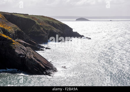 Beautiful view of sunlight sparkling off the sea at Caer bwdy bay near ...