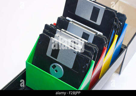 Floppy disk in a box container. White background Stock Photo