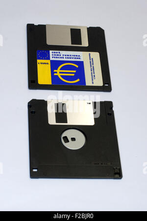 Floppy disk in a box container. White background Stock Photo