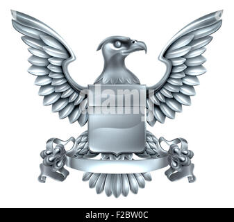 An eagle silver metal shield heraldic heraldry coat of arms design with a banner scroll. Stock Photo