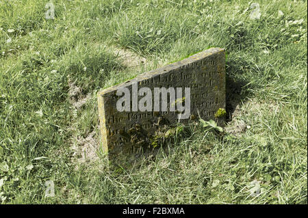 Broken gravestone, St Runius church, Isle of Man Stock Photo