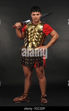 Portrait of Roman soldier with sword isolated over white background ...