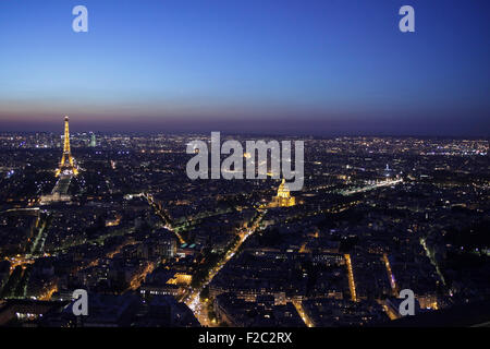 Paris skyline at sunset showing the Eiffel tower and surrounding areas Stock Photo