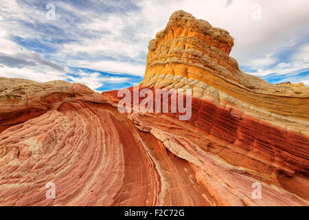 Striped sandstone rock formation at the White Pocket Stock Photo