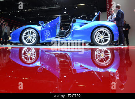 Frankfurt, Germany. 16th Sep, 2015. The new Ferrari 488 Spider is on display at the International Motor Show IAA in Frankfurt/Main, 16 September 2015. Around 1,000 exhibitors from 40 countries will present their latest products at the world's leading motor show, which will run from 17 to 27 September 2015. Credit:  dpa picture alliance/Alamy Live News Stock Photo