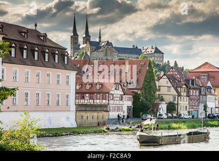 BAMBERG, GERMANY - SEPTEMBER 4: Tourists at the river Regnitz below Michelsberg Abbey in Bamberg, Germany on September 4, 2015. Stock Photo