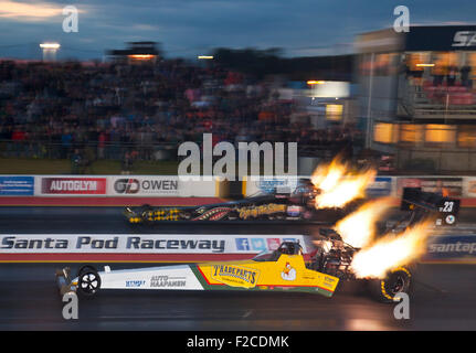 Top fuel drag racing at Santa Pod. Stig Neergaard far side v Anita Mäkelä nearside. Stock Photo