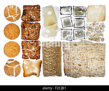 overhead view of crackers and cheese arranged in grid on light table Stock Photo