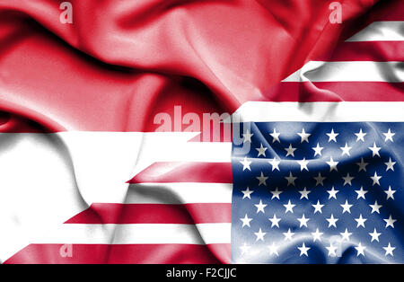 Waving flag of United States of America and Indonesia Stock Photo