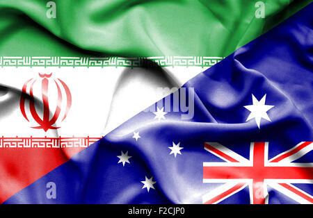 Waving flag of Australia and Iran Stock Photo