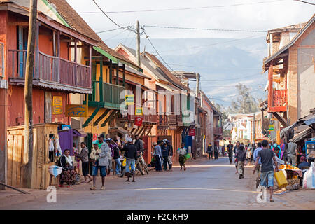 Malagasy locals shopping in the colonial main street of the city Ambalavao, Haute Matsiatra, Madagascar, Southeast Africa Stock Photo