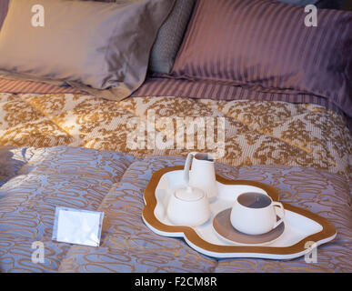 View of Flatware and tray on the bed Stock Photo