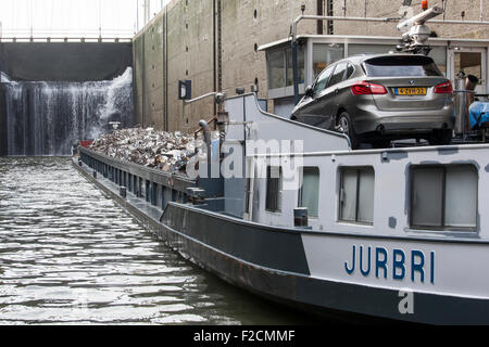 metal scrap on a barge in Belgium Stock Photo