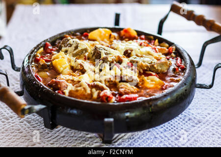 Typical Bulgarian Food Meat with cheese on clay try Bulgarian traditional 